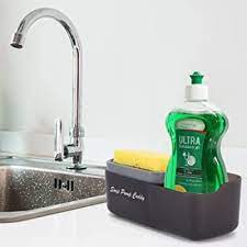 Soap dispenser with sink sponge holder